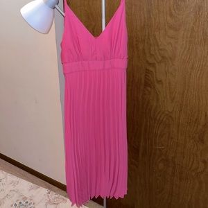 Pink strapless pleated bottle dress